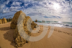 Rock formation on the beach of Tres Irmaos in Alvor, PortimÃ£o, Algarve, Portugal, Europe. Praia dos Tres Irmaos.