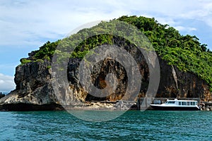 Rock formation and boat at Boracay island in Aklan, Philippines