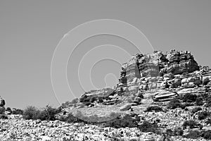 Rock formation in El torcal with the moon in the s