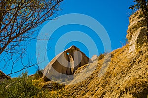 Rock formation at the end of the Zemi valley between Gereme and Uchisar. Goreme region, Cappadocia, Anatolia, Turkey