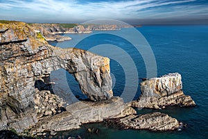 Rock Formation Green Bridge At The Atlantic Coast Of Wales In Pembrokeshire, United Kingdom