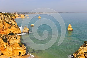 Rock formation and natural arch at Camilo beach