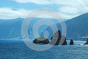 Rock formation at Porto Moniz on the Coast where the Mountains in the north of the Island of Madeira meet the Atlantic Ocean