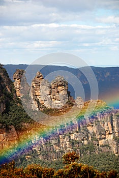 Rock formation with rainbow