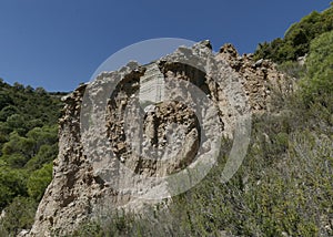 Rock formation with the `Ralla de la Negra` in the background.