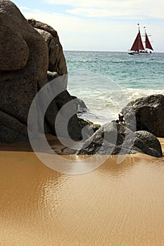 Rock formation with sailboat in Cabo San Lucas