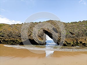 Rock formation in San Antolin beach, Spain photo