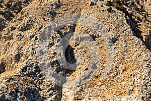 Rock formation showing layers of textured sedimentary rock