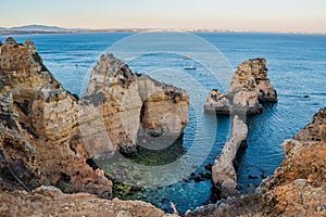 Rock formations in aerial view and clear blue sea at Ponta da Piedade, Lagos - Algarve PORTUGAL photo