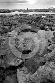 Rock formations with castle in black and white