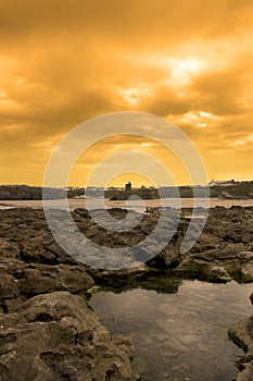 Rock formations with castle at sunset