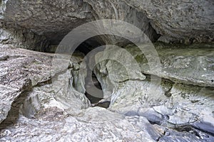 rock formations of cavernous form belonging to the source of the river Alviela where it is possible to watch the water flow.