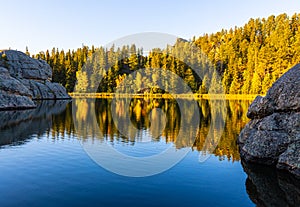 Rock Formations Reflecting on Sylvan Lake