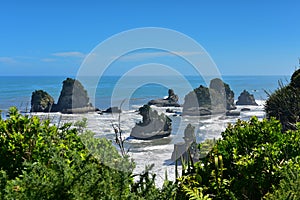 Rock formations and scenic landscape at Motukiekie Beach in New Zealand