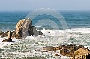 Rock formations on seacoast photo