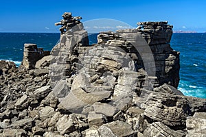 Rock formations in the site of geological interest of the cliffs of the Peniche peninsula, portugal, in a sunny day