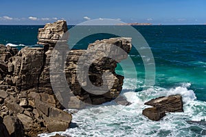 Rock formations in the site of geological interest of the cliffs of the Peniche peninsula, portugal, in a sunny day