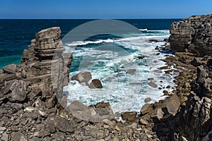 Rock formations in the site of geological interest of the cliffs of the Peniche peninsula, portugal, in a sunny day