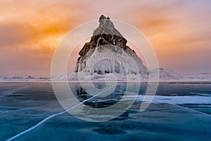 Rock on freeze water lake, Baikal Russia winter season