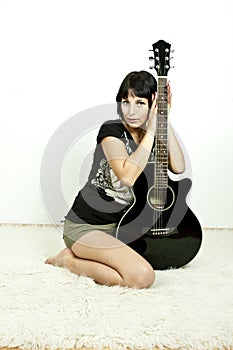 Rock girl with guitar