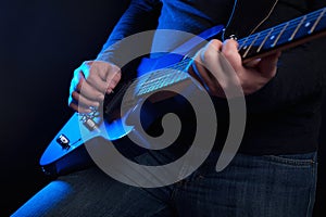 Rock guitarist with blue guitar