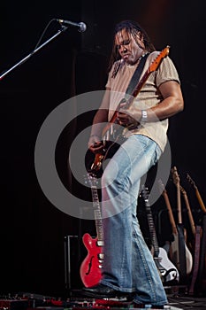 Rock guitarist performing on stage