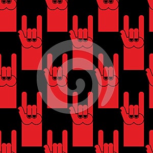 Rock hand sign red seamless pattern. Background of symbol of ro