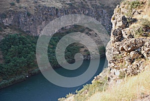 Rock in Hrazdan River in Argel, Armenia photo