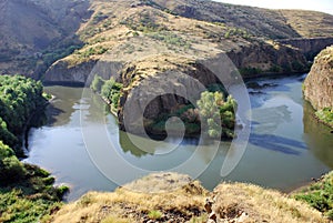 Rock in Hrazdan River in Argel, Armenia photo