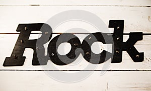 Rock inscription on wood table