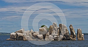 Rock island with cormorants in Lake Victoria