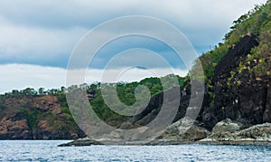 Rock Island over scenic blue sea water