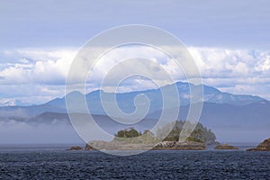 Rock islands in Alaska`s Inside Passage.