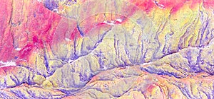 Rock layers - a colorful formations of sedimentary rocks stacked over the hundreds of years. Abstract background with fascinating