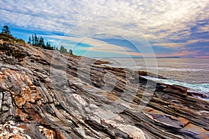 The rock ledges of Pemaquid Point, Maine photo