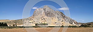 Rock that looks like a head of a sleeping man, Pena de los Enamorados, Andalusia, Spain photo