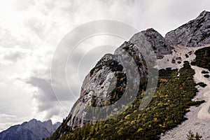 Rock mountain path, green autumn fall forest in Julian Alps, Julijske Alpe, Alpi Giulie, Slovenia Slovenija