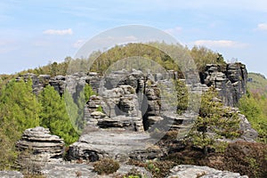 Rock mountain in Tisa overall view with blue sky. Czech landscape