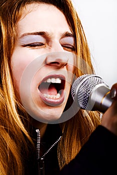 Rock music singer - woman with microphone