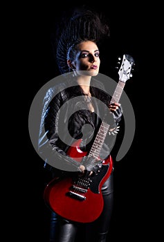 Rock musician in leather clothing isolated