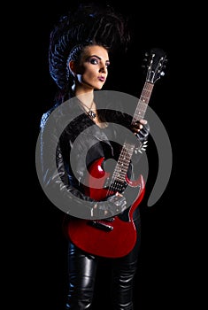 Rock musician in leather clothing isolated