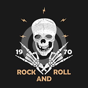 Rock-n-Roll music grunge typography for t-shirt. Clothes design with skeleton hands and skull. Graphics for clothes print, apparel