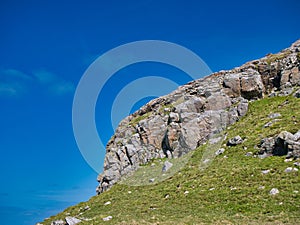 Rock outcrop on the south of the island of Vatersay, Outer Hebrides, Scotland, UK.