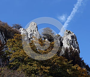 Rock outcroppings in autumn, sunny day