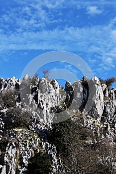 Rock outcroppings in autumn, sunny day