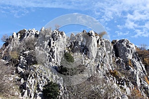 Rock outcroppings in autumn, sunny day photo