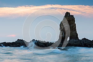 Rock over seacoast during sunset, natural landscape