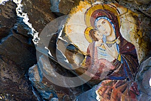 Rock painting of virgin mary and jesus