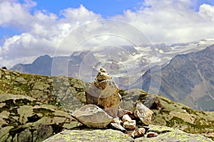 Rock piles cairns guidance on a mountain