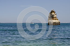 A rock at Praia do Camilo into the Ocean, Lagos, Algarve, Portugal